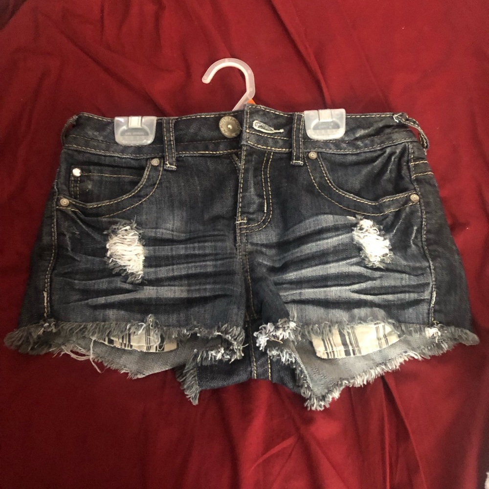 Distressed denim shorts
